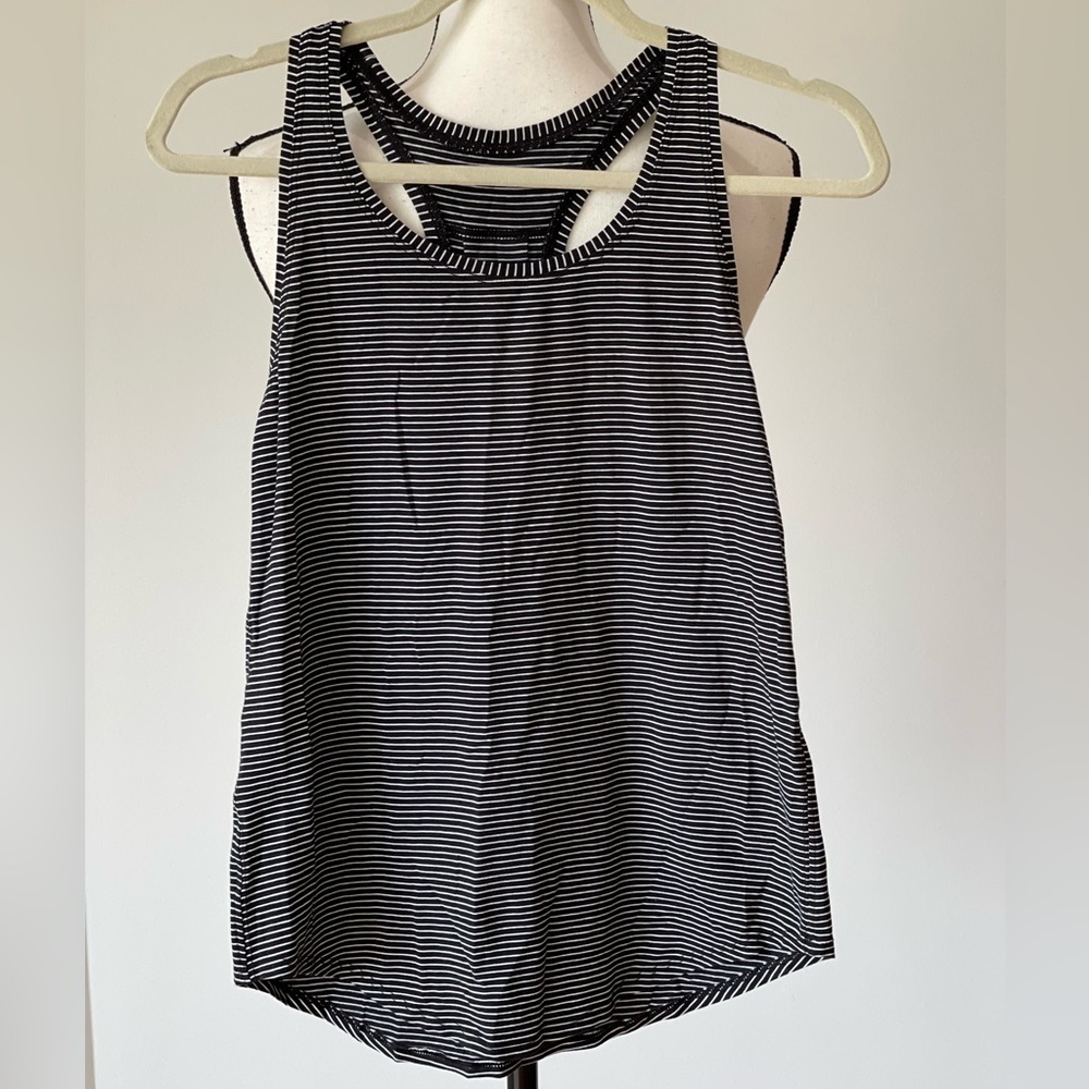 Lululemon black and white stripe racerback tank top in a size 2